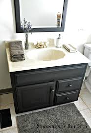 Serendipity Refined How To Update Oak And Brass Bathroom Fixtures With Spray Paint Painting Bathroom Cabinets Brass Bathroom Fixtures Painted Vanity Bathroom
