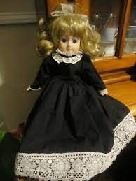 Most of the time the type of porcelain used for these dolls is bisque, which is white and unglazed. 16 Lady Porcelain Doll In Black White Long Dress Ebay