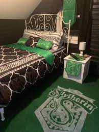 It has the form of a quote from iconic harry potter series and contains of black and gold stylised letters and motifs, a white and gold sash, a magic wand. Just Finished My Slytherin Guest Room Harrypotter