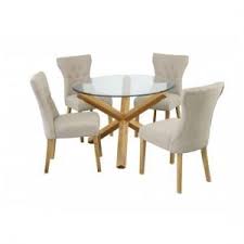 A glass table paired with ghost chairs can create quite the stunning combination.{found on here's a really creative and innovative design when it comes to square tables. Glass Dining Table And 4 Chairs Sets Uk Furniture In Fashion