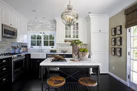 Browse a large selection of kitchen cabinet options, including unfinished kitchen cabinets, custom kitchen cabinets and replacement cabinet doors. Crate And Barrel French Kitchen Island With Industrial Swivel Bar Stools Transitional Kitchen