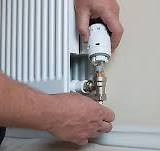How to Fit a TRV | Step-by-Step Guide to Changing a Radiator ...