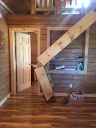 Mar 28 2020 explore customcline s board garage stairs followed by. Power Loft Stair Frees Up Valuable Space Katahdin Cedar Log Homes