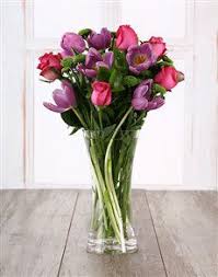 More than 50 years by delivering the freshest flowers and plants to local customers and businesses in the community. Flowers Pink And Purple Surprise Purple And Pink Tulips Have Been Arranged In A Tall Crystal Vase Mothers Day Flowers Happy Birthday Flower Birthday Flowers