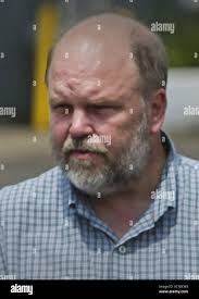 Officer Scott Patrick's brother, Mike Brue, gets a hug from Dakota County  Attorney James Backstrom after the sentencing of Brian Fitch in the death  of his brother in Hastings, Minn., Wednesday, Feb.