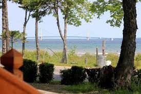 The mackinaw mill creek campground, located in mackinaw city, mi is a campground that offers temporary outdoor living, including overnight stays in cheboygan county. Photo Tour Mackinaw Mill Creek Camping