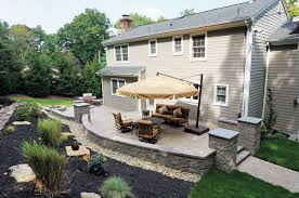 Stock photos of outdoor living spaces decks, patios, entertaining areas, family play times, tiers, different materials, children's spaces, gardens, containers, vegetables, paving, wooden, stone, levels this is a sampling of many images in stock picture library of home and garden outdoor living spaces. Backyard Patios Design Ideas Cornerstone Wall Solutions