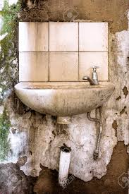 Maybe you would like to learn more about one of these? Photo Of Old Damaged And Dilapidated Bathroom Sink With Mold Stock Photo Picture And Royalty Free Image Image 72382477