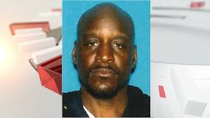 Police arrest man in connection with woman's shooting death