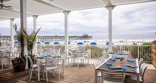 Save to favorites dune navy double chaise sofa lounge with canopy. 32 Outdoor Dining Spots In Charleston Explore Charleston Blog