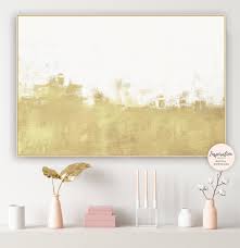 Skyline drive living room set gray sectional with matching chair and ottoman, offset by gray and white accent pillows and gold pieces of decor. Large Minimalist Painting White Gold Painting Printable Art Etsy