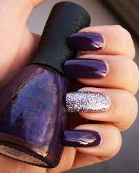 Purple, violet and white nail art in one design. Purple Acrylic Nails With Glitter On Ring Finger Nail And Manicure Trends