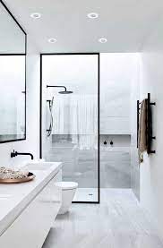 Inside the tile backsplash fades from black to white, creating an intriguing ombre design. The Easiest Way To Finish Your Bathroom Project Is With These Lighting Ideas Www L Minimalist Bathroom Design Minimalist Bathroom Toilet And Bathroom Design