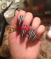 Black And White Striped Stiletto Nails Wicked Witch Nails Black And White Stripped Stiletto Nails With Red Accent Nailed It Nails Black Nails Halloween Nails