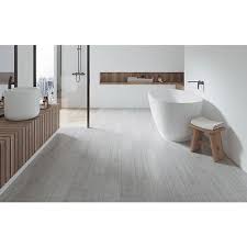 As you probably know black or dark grout is like drawing a line and if it's not perfect people notice. Wickes Kielder Light Grey Wood Effect Porcelain Wall Floor Tile 900 X 150mm Wickes Co Uk