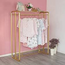 And when not in use racks collapse under an attractive top shelf that can hold supplies or decorative. Amazon Com Heavy Duty Gold Clothing Rack For Boutique Use Metal Garment Rack With Top Shelf D Metal Clothes Rack Clothing Rack Display Boutique Clothing Rack