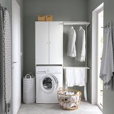 Une buanderie avec une machine à laver et sèche linge en. Nysjon Meuble Pour Machine A Laver Blanc 65x190 Cm Ikea