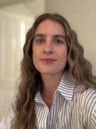 SHE is a woman. YOU are a POS. Crawl back into your hole