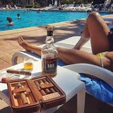 Image May Contain One Or More People People Sitting Table And Outdoor Cigars And Whiskey Cigars Cigars And Women
