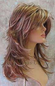 You can balance the layers with long bangs that can be styled to either side or straight. Long Hair Short Layers