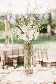 With fall in full swing, we have officially reached the point where some of our trees have lost all of their leaves. Curly Willow Branch Wedding Centerpiece