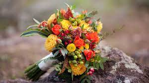 A blend of autumnal foliage and gorgeous blooms makes for an unforgettable arrangement. 15 Fall Wedding Bouquets