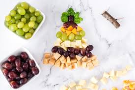 How to make a fruit christmas tree. Christmas Tree Cheese Platter Recipe Amanda S Cookin