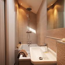 This tiny bathroom is made to feel much larger by the inclusion of mirror all around the room. Narrow Ensuite Houzz