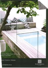 Raised Pool Decking Around Small Pool Talk About Dreaming But How Nice Backyard Pool Raised Pools Backyard Landscaping Designs