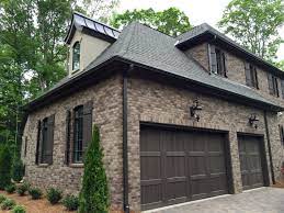 If you want a way to make your home stand out from the crowd creating a rich and layered appearance a dark exterior house trim. Arh Asheville 1131f Plan Exterior 40 Stone Oakridge Gray Mortar Brick Bora Brick House Exterior Colors House Exterior Color Schemes Brick Exterior House