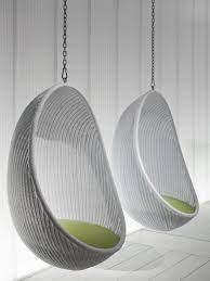 Furniture Nice Looking White Woven Rattan Two Hanging Egg Chair With White Wooden Wall Panels As Decorate Hanging Chair Indoor Hanging Egg Chair Hanging Chair