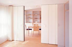 From 1 Room To 2 The Insider S Guide To Temporary Pressurized Walls Room Divider Bookcase Temporary Room Dividers Room Divider