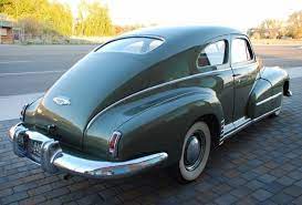 Last Of The Prewar Relics 1948 Oldsmobile Club Sedan Fastback Oldsmobile Cool Old Cars Sedan