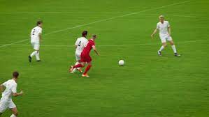 Or the field becomes waterlogged and makes it dangerous. Professional Soccer Players Playing Pass Stock Footage Video 100 Royalty Free 1019537770 Shutterstock