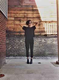 All Black Outfit Of Loose Trousers With A Tee Boots And Sunglasses Fashion