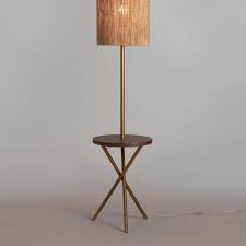 Inspired By Mid Century Modern Design Our Exclusive Floor Lamp Features A Walnut Finished Round Wood Tab Stylish Floor Lamp Floor Table Lamps Floor Lamp Table