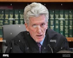 Judge John Canavan speaks in Plymouth District Court during Lindsay  Clancy's arraignment in the killing of her three children, Tuesday, Feb. 7,  2023, in Plymouth, Mass. (Chris Christo/The Boston Herald via AP