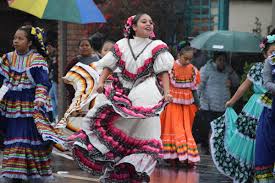 A Look Back at the Rain-Splattered 64th Annual Swallows Day Parade