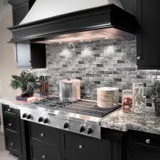 A faux brick backsplash uses tiles shaped and textured like bricks. Gray Backsplash Brick Joint Mosaic Tile Tile The Home Depot