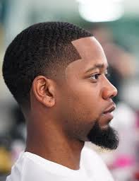This clean look is the perfect combination of retro and modern. Top 100 Black Men Haircuts
