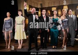 Berlin, Germany. 11th Dec, 2019. The actors Kristina Stebner, Hannah Redlich,  Tam Ward, Janko Danailow, Katia Bischoff, Dorina Djouglarska and Randy  Diamond (l-r) sing during the photo rehearsal at the Ritz Carlton Berlin.  Ward and Danailow play the ...