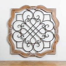 Quatrefoil iron wall plaque with hooks. Natural Wood And Metal Isabelline Wall Plaque Kirklands