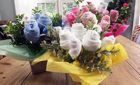 The Sweetest Diy Baby Shower Gift A Washcloth And Onesie Bouquet Project Nursery