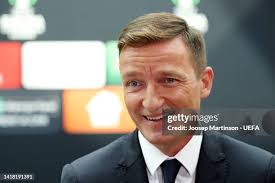 Kevin Lamour, UEFA Deputy General Secretary and Robbie Keane, former...  News Photo