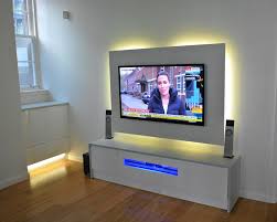 Make sure that you select one that is the appropriate size for both your television and your living room. Media Wall Backlit Leds Bedroom Makeover Interior Living Room Remodel