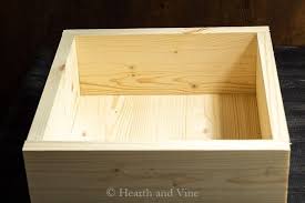 Wooden Box Centerpiece You Can Easily Put Together In No Time Wooden Box Centerpiece Wooden Box Diy Wooden Boxes