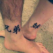 Ankle Tattoos Of The Chinese Symbol For Brothers Left And Chinese Symbol For Younger Sister Right On Zoe An Ankle Tattoo Men Foot Tattoos Tattoos For Guys