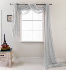 Curtain draping allows more light into your space, but the arrangement of the curtains can limit privacy. Winston Porter Brannon Solid Sheer Window Scarf Reviews Wayfair