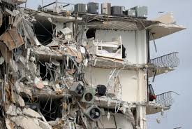 Surfside mayor charles burkett said during a news conference that the building manager told him 'the building is literally pancaked': Aj8ca07nofmdqm