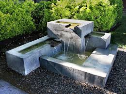 A water feature, however small, lends a garden an added dimension, making it a place of relaxation and contemplation, and this is only one reason why water is an increasingly common element to be found in gardens. Modern Gardens How To Design And Create Your Own Contemporary Garden Water Fountains Outdoor Modern Outdoor Fountains Fountains Outdoor
